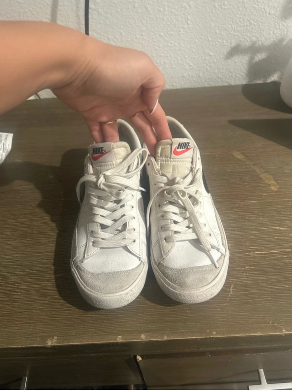 Nike Kids White Sneakers with Black Swoosh and Red Logo